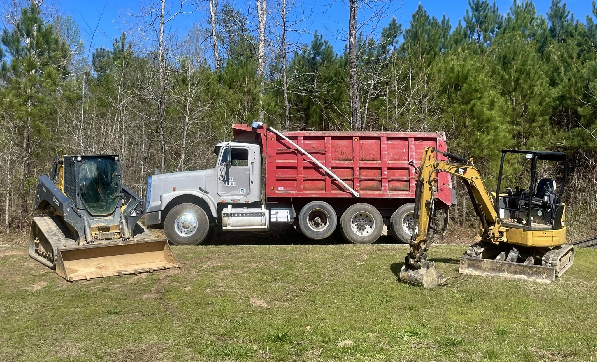Excavation contractor grading a residential site in Bremen, AL