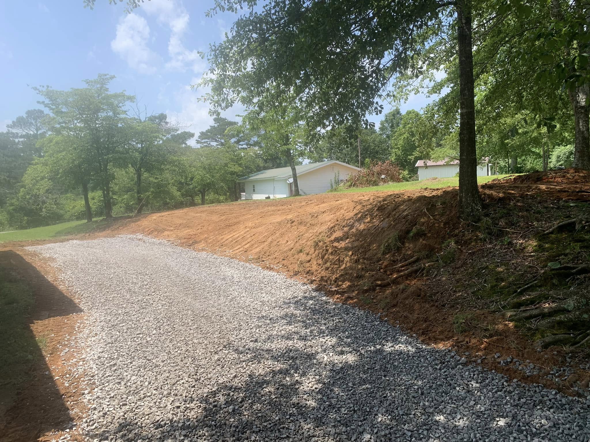 Land clearing service removing brush and trees near Bremen, AL
