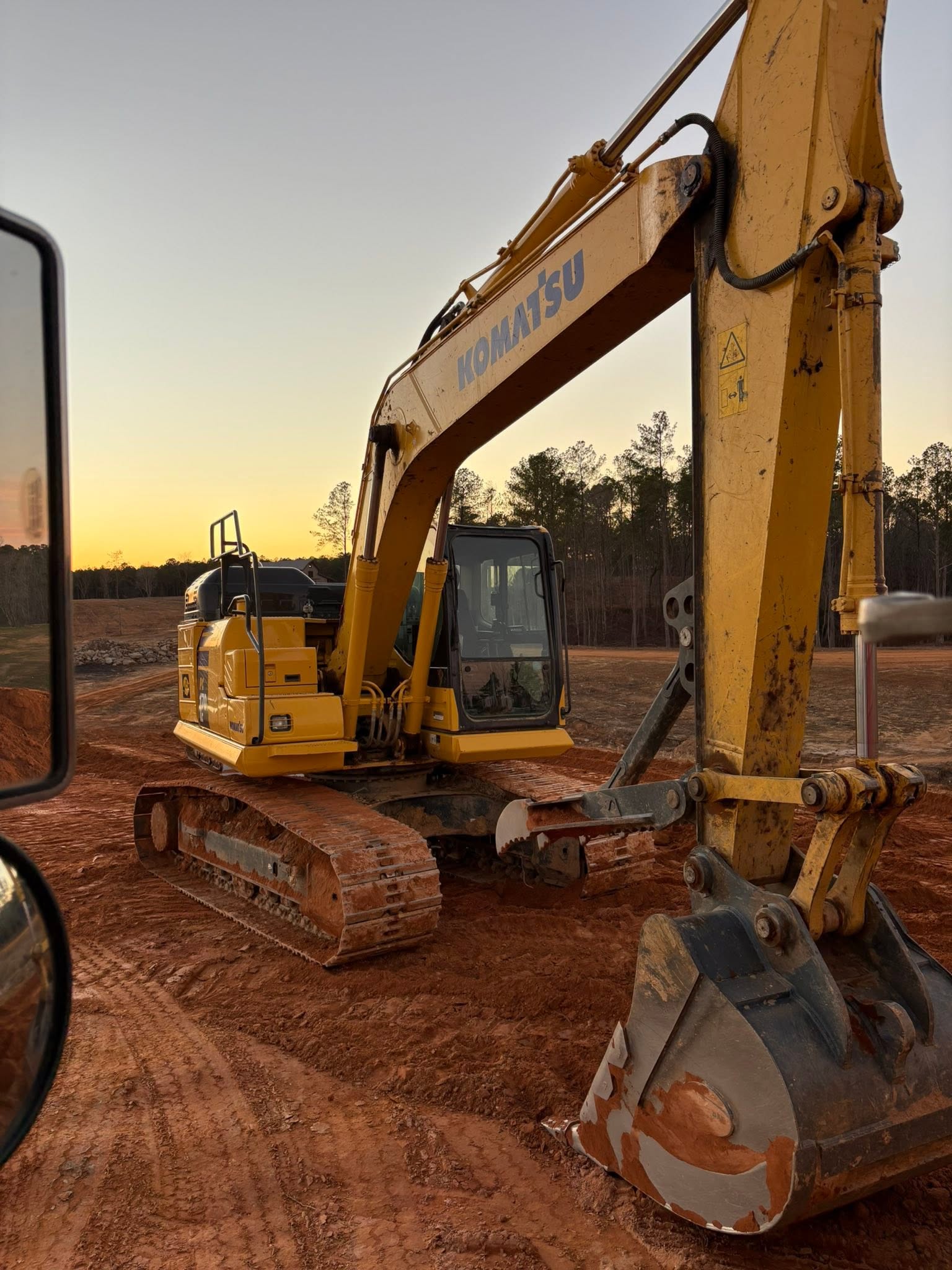 Family-owned C&H Hauling and Excavating operating an excavator in Bremen, AL