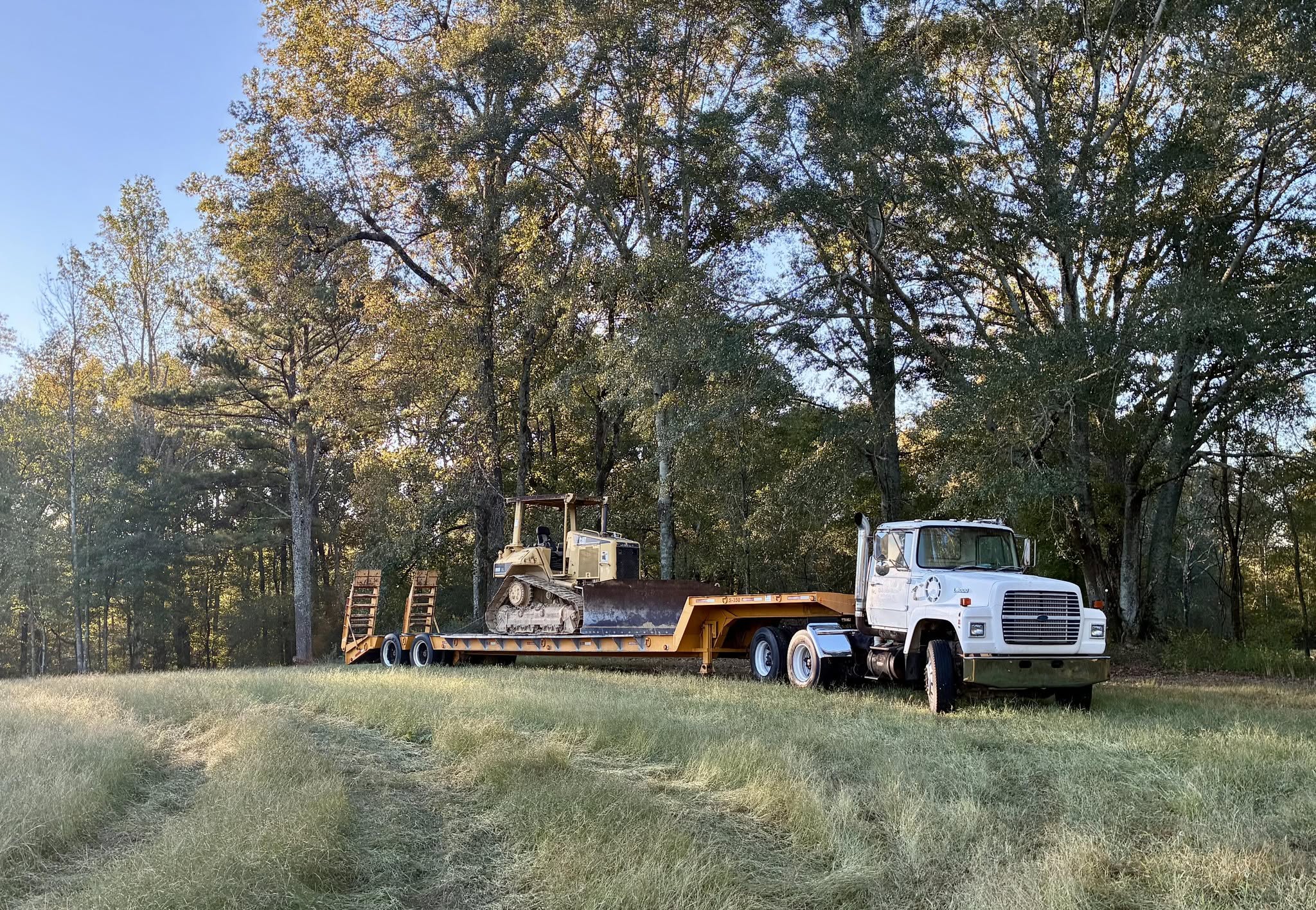 Freshly graded building pad and site prep on a Cullman County field