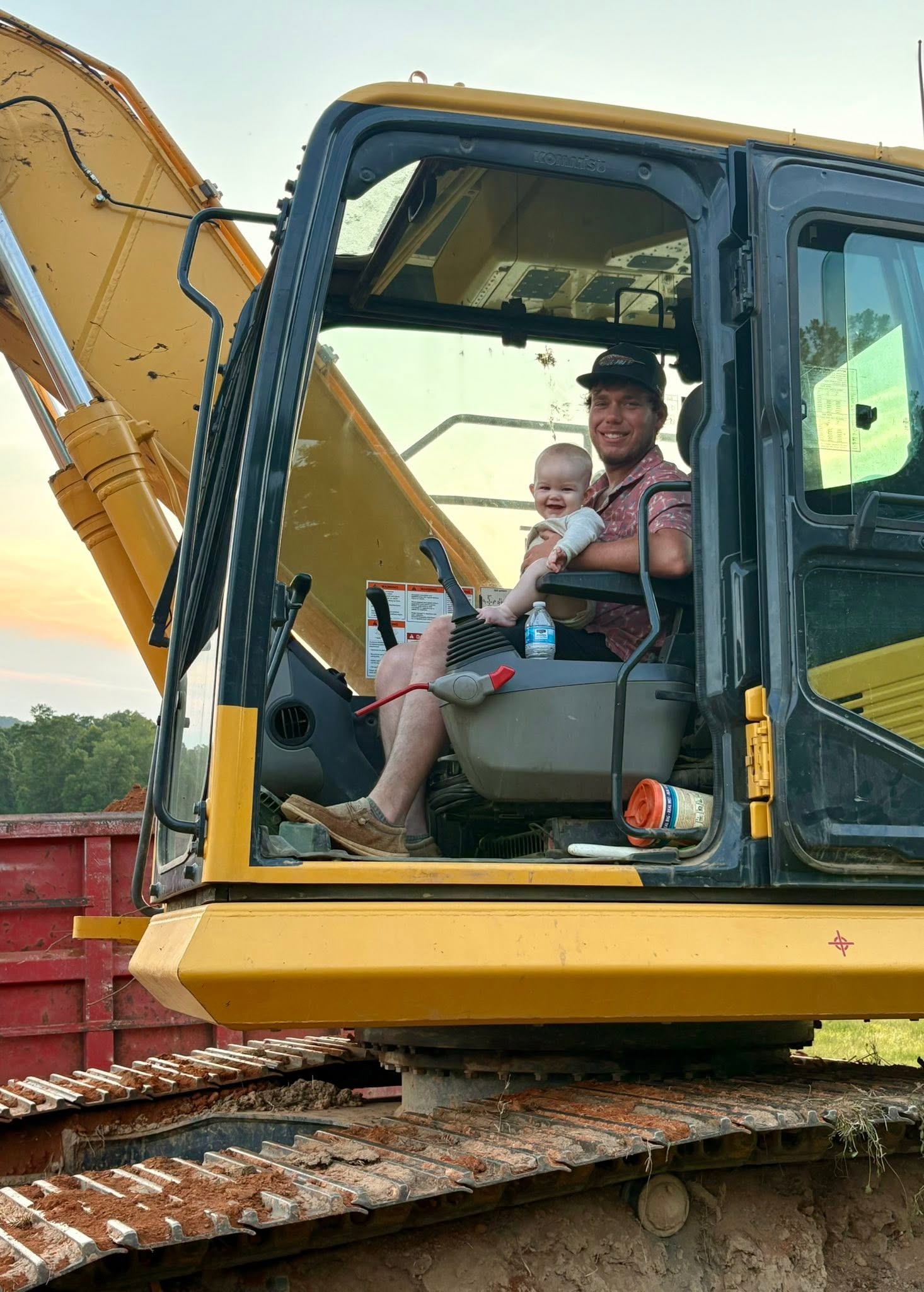 Hauling and land development equipment on a Cullman County job site
